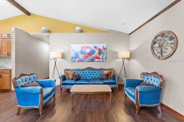 living room with vaulted ceiling with beams, wood finished floors, and baseboards