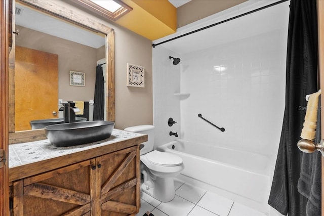 full bathroom with tile patterned flooring, toilet, vanity, and shower / bath combo