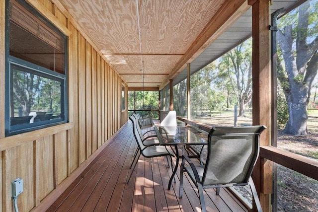 sunroom with wooden ceiling