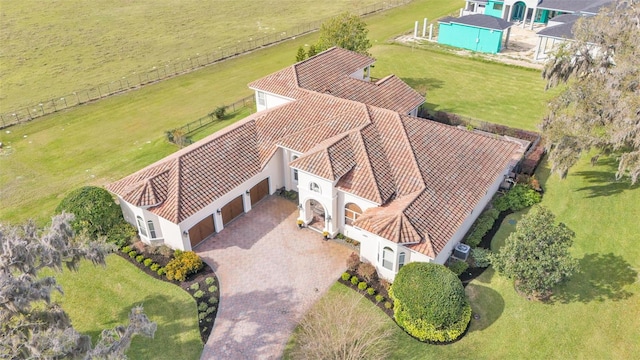 birds eye view of property featuring a rural view