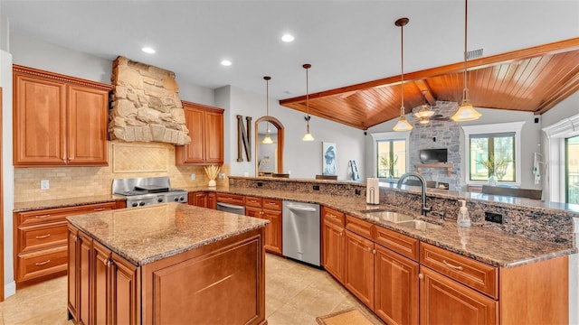 kitchen with visible vents, a sink, backsplash, stainless steel dishwasher, and custom exhaust hood