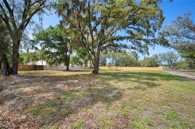 view of yard with fence