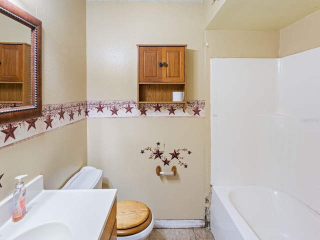 full bathroom featuring toilet and vanity