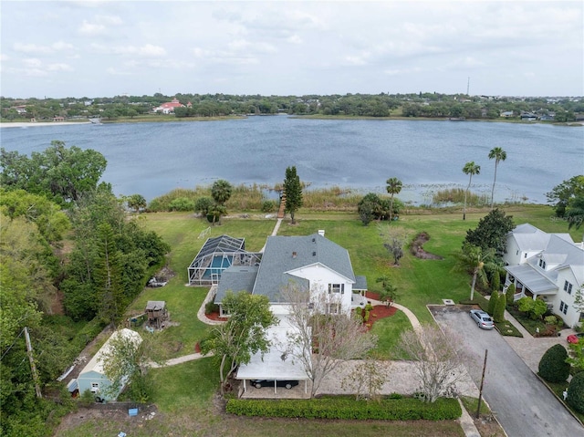 drone / aerial view with a water view