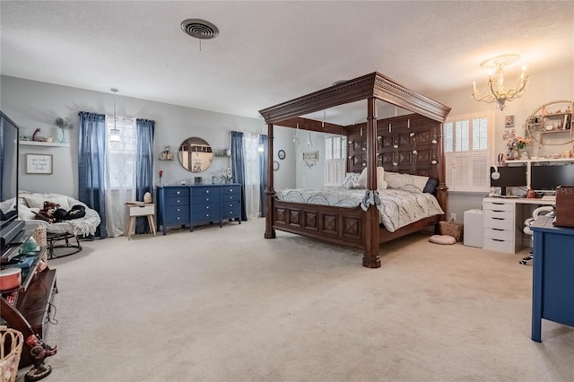 bedroom featuring visible vents, carpet, a notable chandelier, and a textured ceiling