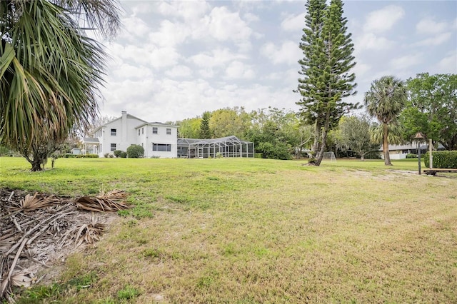 112 E Graham Park Dr, Haines City, FL 33844 - view of green lawn with glass enclosure