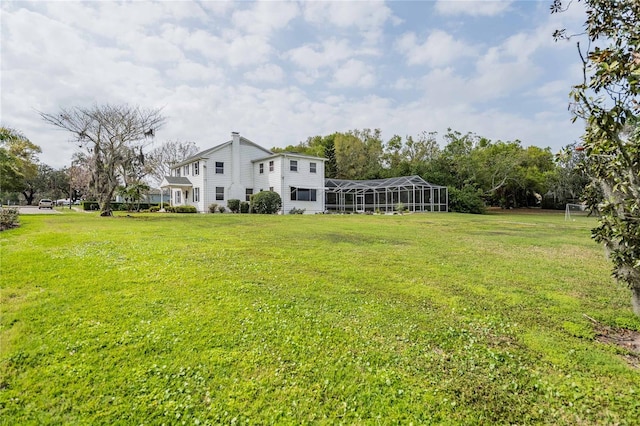 112 E Graham Park Dr, Haines City, FL 33844 - view of green lawn featuring a lanai