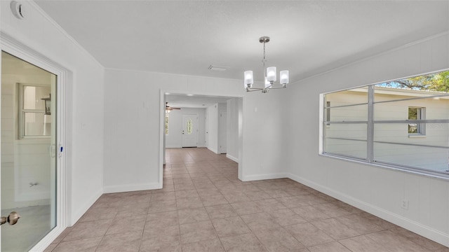 interior space with a chandelier, light tile patterned floors, crown molding, and baseboards