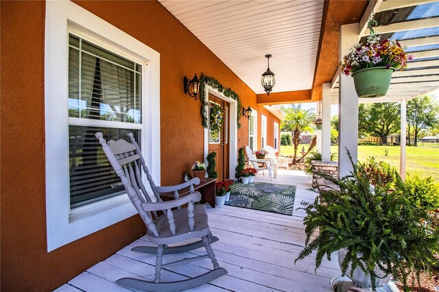 deck featuring covered porch