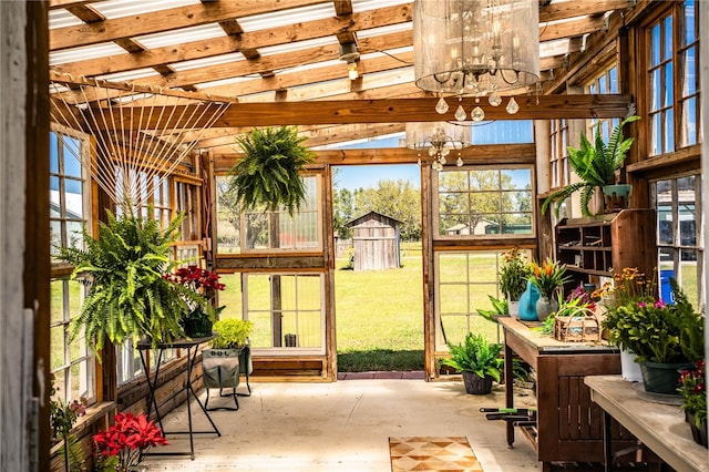 sunroom with a chandelier