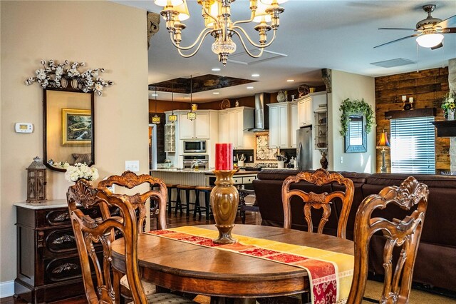 dining area featuring recessed lighting, visible vents, and ceiling fan with notable chandelier