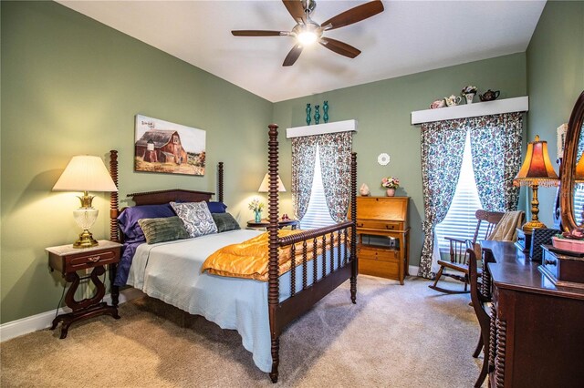 bedroom featuring baseboards, carpet floors, and ceiling fan