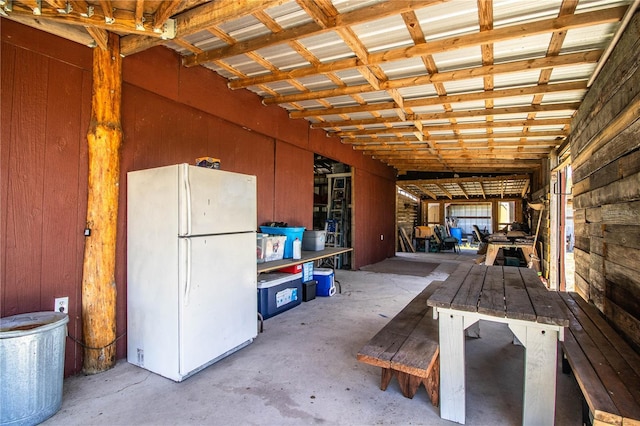 misc room featuring unfinished concrete floors