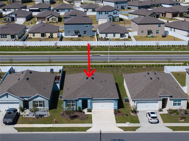 drone / aerial view featuring a residential view