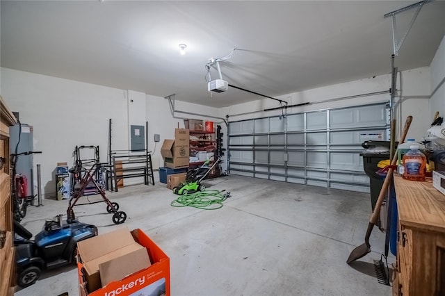 garage featuring electric panel and a garage door opener