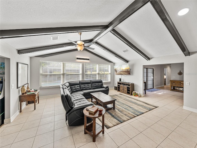 living area featuring visible vents, a textured ceiling, light tile patterned floors, ceiling fan, and vaulted ceiling with beams