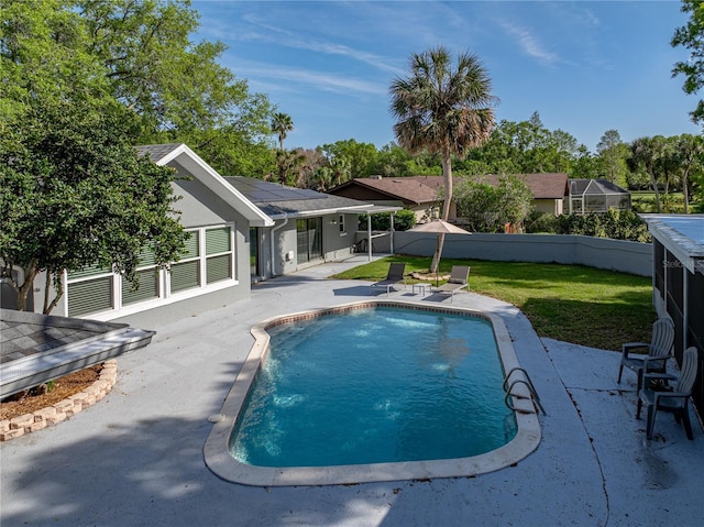 view of pool featuring a patio area, a fenced in pool, a yard, and a fenced backyard
