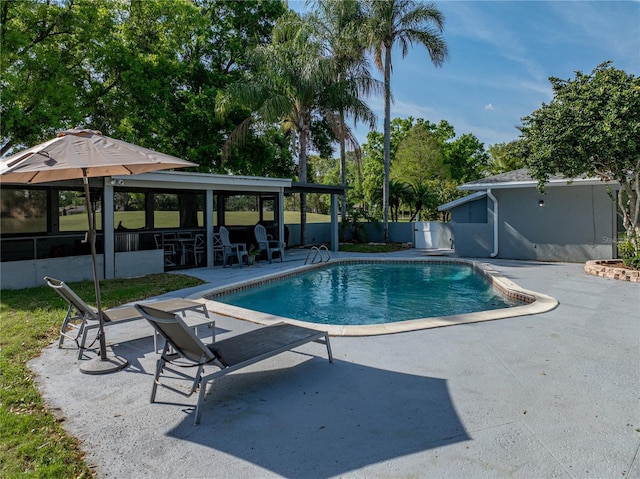 view of pool with a patio, a fenced in pool, and fence