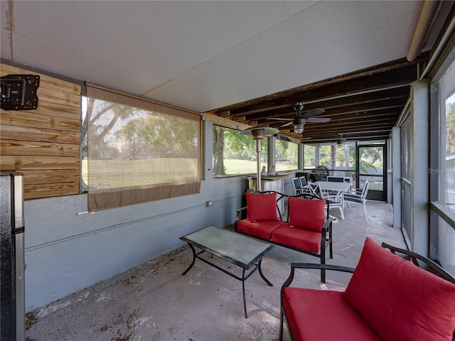 sunroom / solarium with ceiling fan