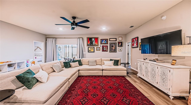 living room with recessed lighting, visible vents, ceiling fan, and light wood finished floors