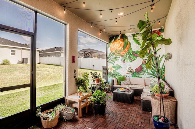 sunroom with rail lighting