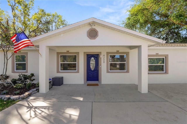 view of front of home featuring stucco siding