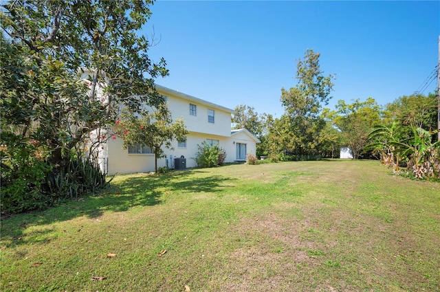 view of yard featuring central AC