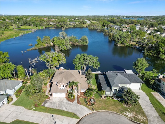 bird's eye view featuring a residential view and a water view