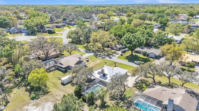 birds eye view of property with a residential view