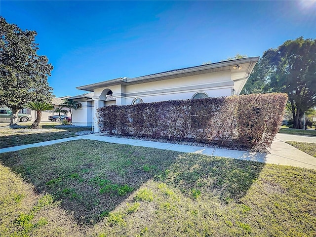 view of front of home with a front yard