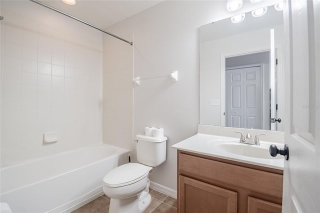 full bathroom featuring baseboards, shower / washtub combination, toilet, tile patterned floors, and vanity