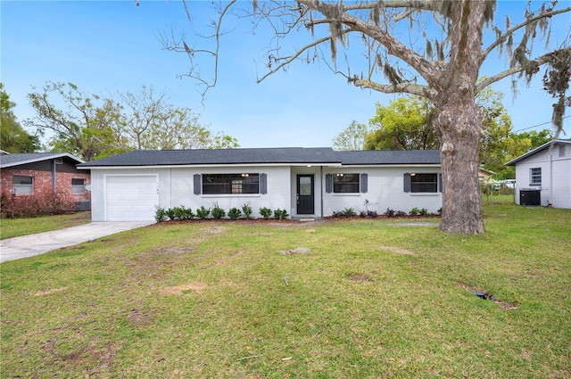 ranch-style home featuring brick siding, an attached garage, a front lawn, central AC unit, and driveway