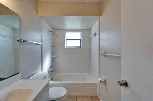 bathroom with shower / bath combination, toilet, vanity, and tile patterned flooring