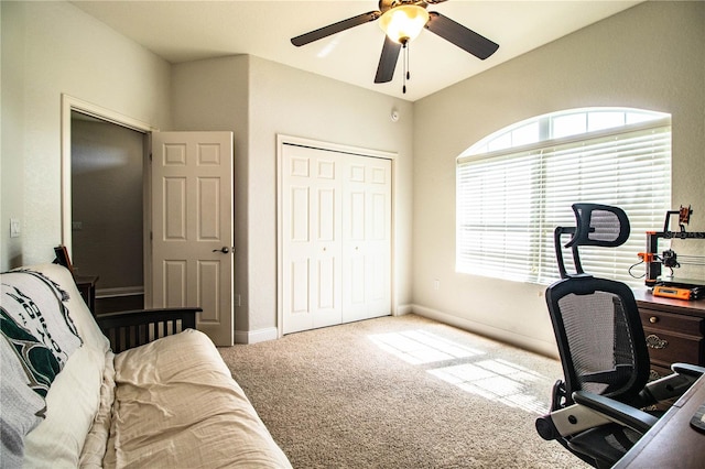 office area with baseboards, carpet, and a ceiling fan