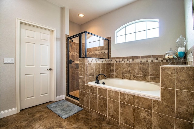 bathroom with tile patterned flooring, a shower stall, a garden tub, and recessed lighting