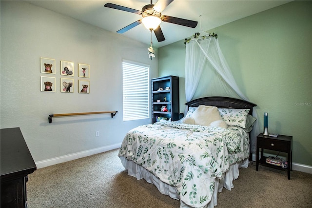 bedroom featuring carpet flooring, a ceiling fan, and baseboards