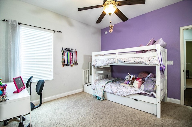 bedroom featuring baseboards, carpet floors, and ceiling fan