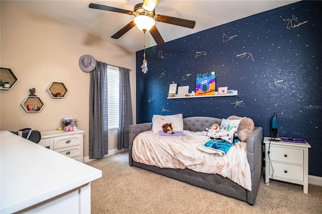 bedroom featuring baseboards, carpet flooring, wallpapered walls, and ceiling fan