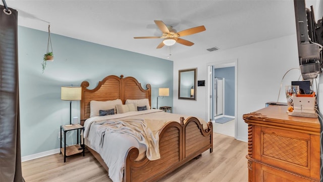 bedroom featuring visible vents, ceiling fan, baseboards, and light wood-style floors