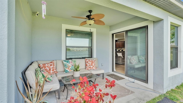 view of patio / terrace featuring an outdoor living space and ceiling fan