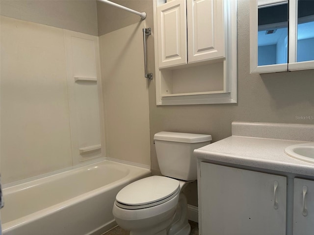 full bath featuring bathing tub / shower combination, toilet, and vanity