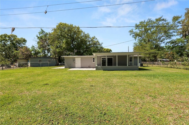 view of yard featuring a patio and fence