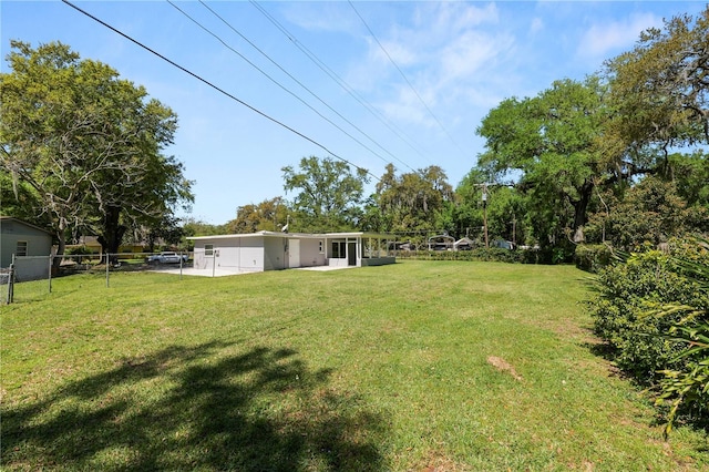 view of yard with fence