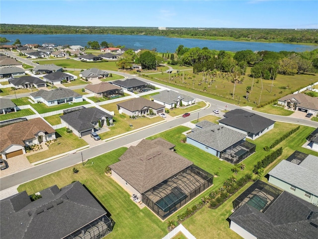 aerial view featuring a residential view and a water view