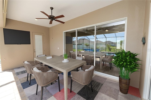 dining space featuring a ceiling fan and a sunroom