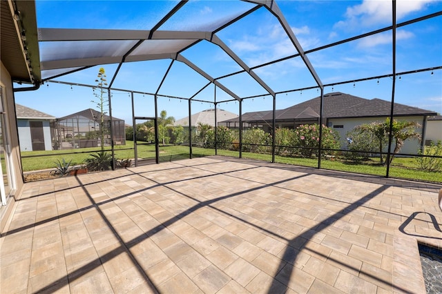 view of patio / terrace with glass enclosure