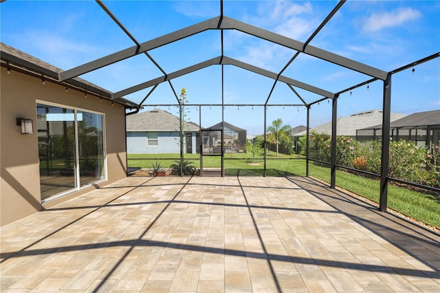 view of patio / terrace with glass enclosure