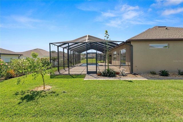 view of yard featuring a fenced in pool, a patio, and a lanai