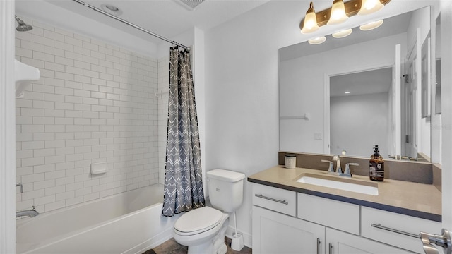 full bath featuring vanity, toilet, and shower / tub combo with curtain