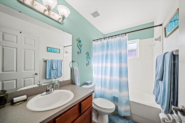 full bathroom featuring visible vents, toilet, vanity, and shower / tub combo